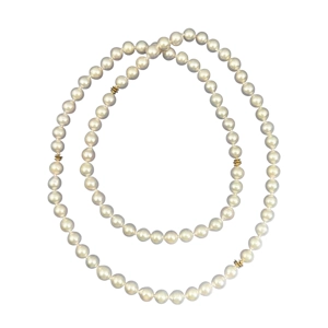 Akoya pearls necklace with 18 karats yellow gold elements - Italy 1970s